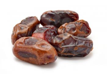 Group of natural Arabian dried dates on white background.