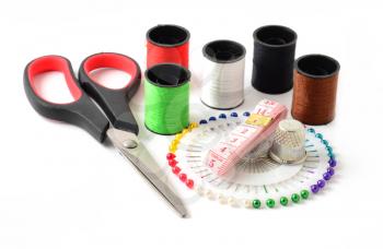 Set of sewing accessories over white background.