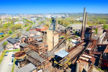 Aerial view of the old rusty abandoned ironworks factory area with a tilt-shift effect. Miniature tilt-shift effect of the old ironworks factory.