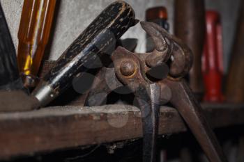 Vintage Rusted and Worn Tools In a Workshop