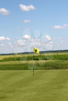 two golf yellow flag