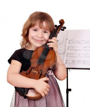 little girl with violin posing