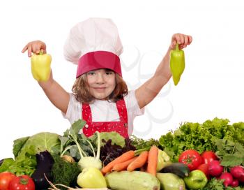 little girl cook holding peppers