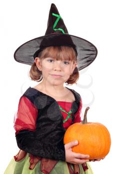 little girl witch with pumpkin