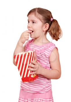 hungry little girl eat popcorn