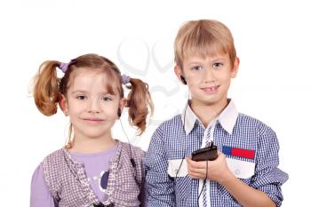 little girl and boy listening music on smart phone