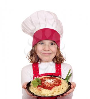 beautiful little girl cook hold dish with spaghetti