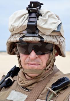 US marine in the desert uniform and protective military eyewear