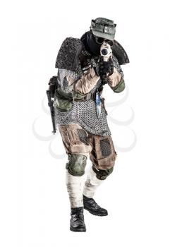 Nuclear post-apocalypse survivor, alternative history nazi soldier or partisan in wool field cap, face mask, glasses and handmade armor, aiming submachine gun in camera studio shoot isolated on white