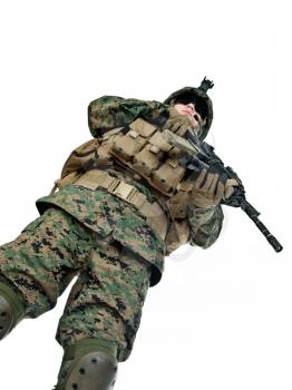 US soldier with his assault rifle on white background