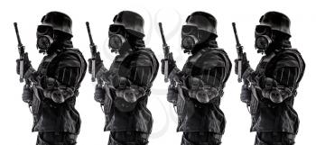 Line of futuristic nazi soldier sentinel gas mask and steel helmet with schmeisser handgun isolated on white studio shot standing to attention profile