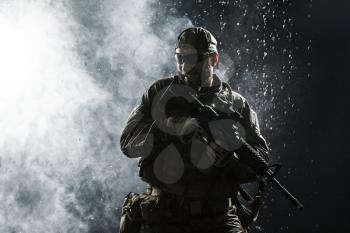 Green Berets US Army Special Forces Group soldier in the rain