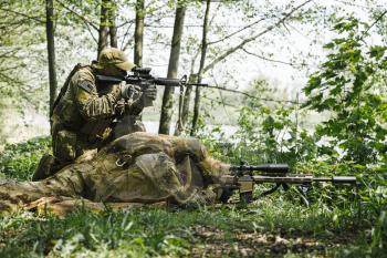 Sniper and spotter of Green Berets US Army Special Forces Group in action