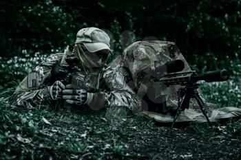 Sniper and spotter of Green Berets US Army Special Forces Group in action