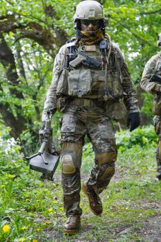 Green Berets US Army Special Forces Group soldier in action