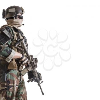 United states Marine Corps special operations command Marsoc raider with weapon. Studio shot of Marine Special Operator white background copyspace