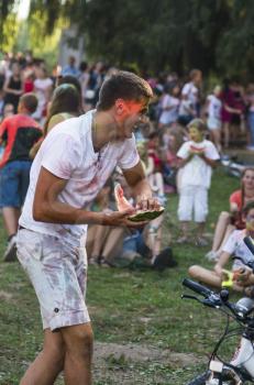 Lviv, Ukraine - August 30, 2015: Man  have fun during the festival watermelon  in a city park in Lviv.