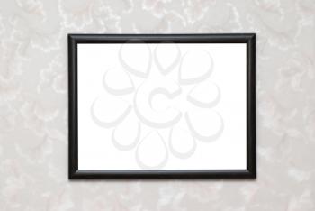 Empty blank black isolated photo frame on white wall