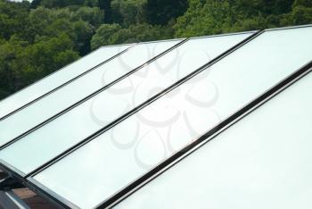 Solar water heating system on the red roof. Gelio panels.