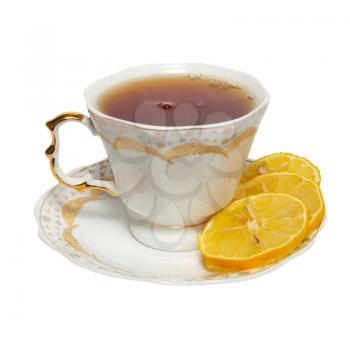 Teacup with tea and lemon isolated on white.