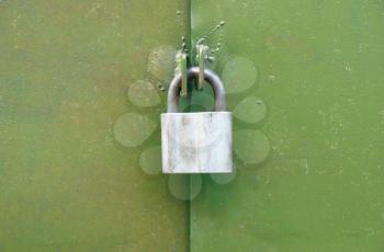 Lock on the green door.