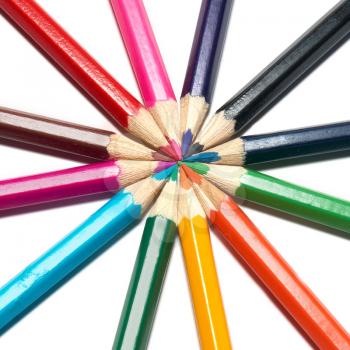 Circle of colored pencils with white isolation