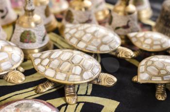 Brass turtle inlaid with mother-of-pearl.A casket souvenir from India.