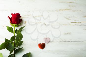 Rose and silk hearts on white wooden background, Valentines Day background, wedding day background