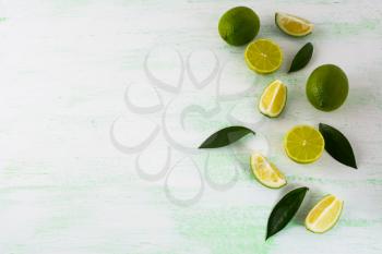 Healthy eating concept with limes and lemons. Fresh food. Vegetarian food. Fresh fruit. Mixed fruit. Fruit background. Healthy eating concept. Ripe fruit. Citrus fruit.