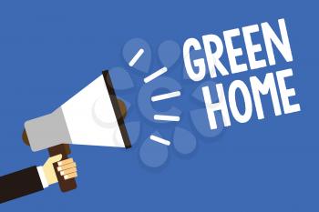 Handwriting text writing Green Home. Concept meaning An area filled with plants and trees where you can relax Man holding megaphone loudspeaker blue background message speaking loud