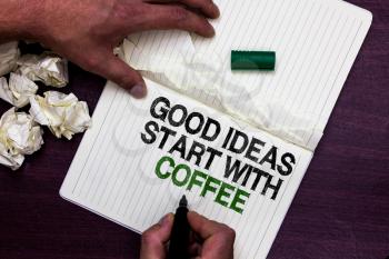 Text sign showing Good Ideas Start With Coffee. Conceptual photo caffeine lovers start day with it to do more Man holding marker notebook page crumpled papers several tries mistakes