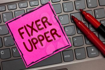 Text sign showing Fixer Upper. Conceptual photo house in need of repairs used chiefly connection with purchase Pink paper keyboard Inspiration communicate ideas messages Red markers