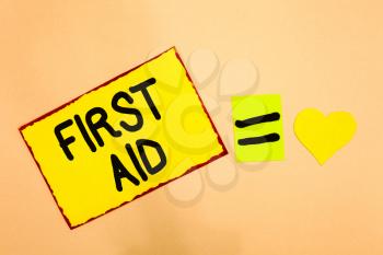 Conceptual hand writing showing First Aid. Business photo text Practise of healing small cuts that no need for medical training Yellow paper reminder equal sign heart sending romantic feelings