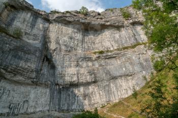 View of the curved cliff at Malham Cove in the Yorkshire Dales National Park