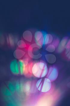 Bright colorful bokeh lights effect, vintage defocused background.