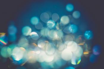 Abstract defocused background with colorful bokeh lights effect.