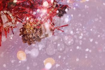 Colorful image with small red Christmas tree and falling snow.
