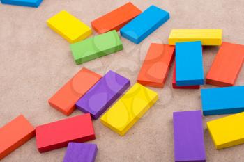 Wooden blocks of various color randomly scattered