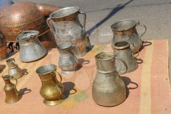Selling old metal  cookware in bazaar