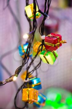 Christmas and party lights in the form of colorful gift boxes