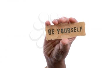 Be yourself text with Pen and plain paper as motivational concept