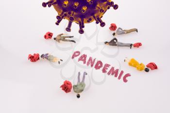 Human Figures beside Pandemic wording