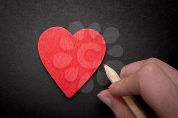 Heart and pencil for love and valentine day concept