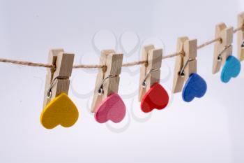Colorful hearted clips on a thin rope