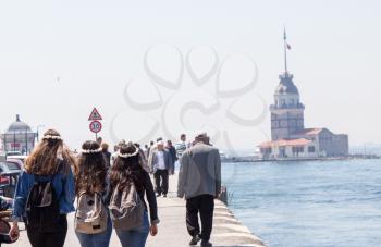 People towards Maidens Tower located in the middle of Bosporus