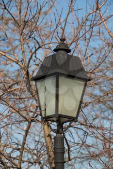 Old electric street lamps made of metal in retro style