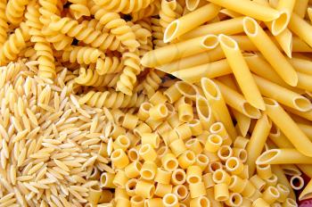 Four kinds of italian pasta. Food background.