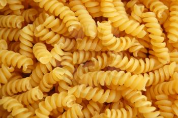 Eliche twirls pasta detail. Italian food background.