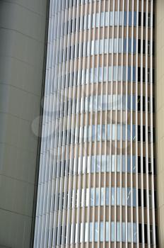 Glass facade of a modern office building. Architectural background.