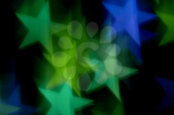 Blue and green stars bokeh abstract motion blur. Colorful background.